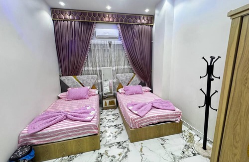 Al Haram Apartment | The "Villa of Dreams VIP" is reserved exclusively for families. The renter is required to provide a security deposit, which will be refunded upon checkout.