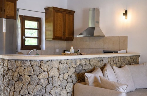 Kavvadades Villa | Dazzling Corfu Villa | Villa Emerald Horizon | 2 Bedrooms | Spacious Furnished Terrace with Shaded Outdoor Dining Area | Private Garden, Pool and Hot Tub | Prime Location | Arillas, Mega Lithari