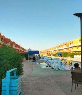 Al-Janayin Apartment | Relaxing Chalet with Pool & Sandy Beach