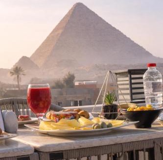 Kafrat al Jabal Hotel | pyramids palace view With Rooftop Access