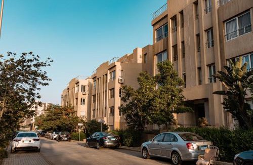 Sheikh Zayed City Apartment | Top-rated 1BR with Private Garden in Compound - only families & single travelers