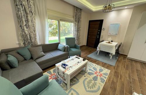 Sheikh Zayed City Apartment | Top-rated 1BR with Private Garden in Compound - only families & single travelers