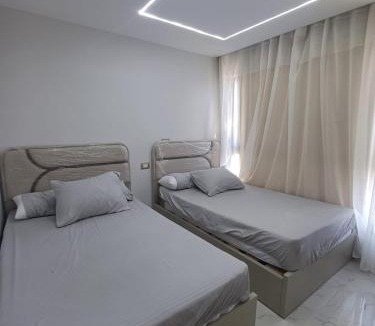 Al-Manasrah Ski Chalet | Two bedrooms and an upstairs living room