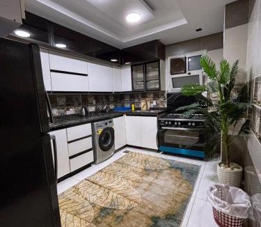 Al Duqqi Apartment | Cozy Twin Room Central Mohandessin near El-Dowal
