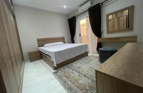 Al Mamsha El Seyahi Apartment | marvel white apartment