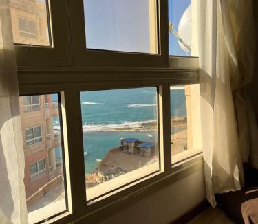 Al-Muntazah Apartment | شقة فندقية راقية ڤيو البحر بميامي الاسكندرية A unique sea view apartment in Miami, Alexandria