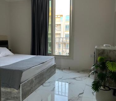 Al Mamsha El Seyahi Apartment | Pool View Apartment Near Airport & Beach