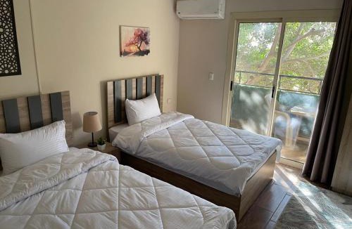 Giza Apartment | Timo Pyramids View