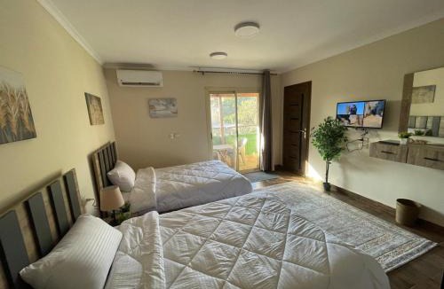 Giza Apartment | Timo Pyramids View