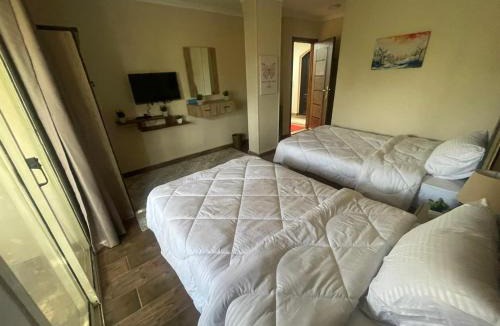 Giza Apartment | Timo Pyramids View