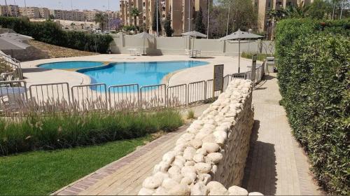 Sheikh Zayed City Apartment | Luxerious apartment with a private garden and pool access