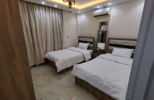 Al Qanatir al Khayriyah Apartment | مدينتي