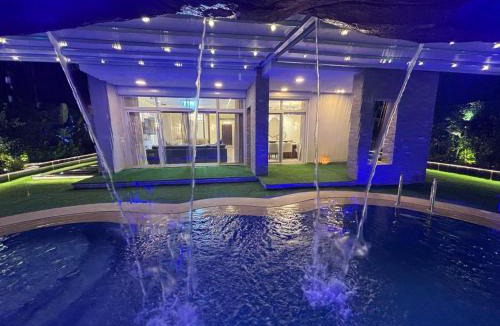 New Cairo House | 7 BR Smart House with Heated Pool, Waterfall, Garden