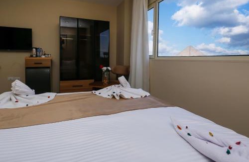 Kafrat al Jabal Hotel | pyramids palace view