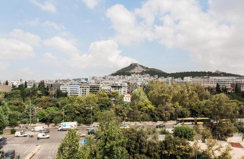 Pangrati Apartment | Central high-class and safe rooms next to Metro Airport Line with Acropolis View from balcony