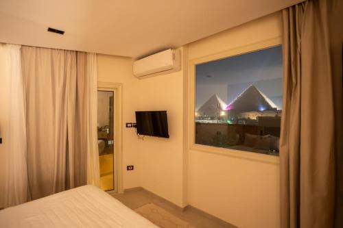 Riwaq Pyramids View Inn & Rooftop