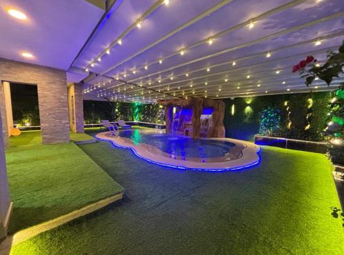 7 BR Smart House with Heated Pool, Waterfall, Garden in Cairo